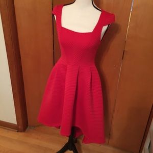 Red hi-low scuba material dress. Great condition.